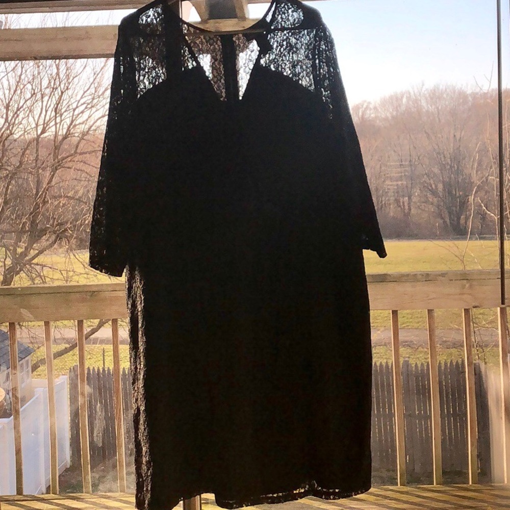 Evening or semi formal black full laced dress.